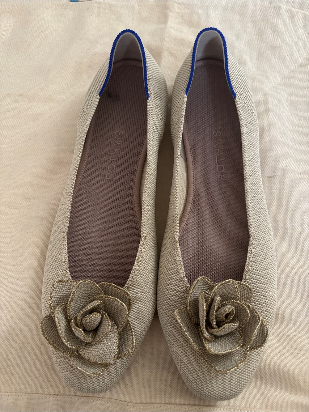 Rothy's Beige Ballet Flats with Gold Floral Accent